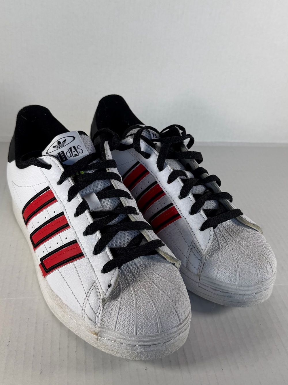 adidas Men’s White Superstar Sneakers with Red Stripes and Black Laces